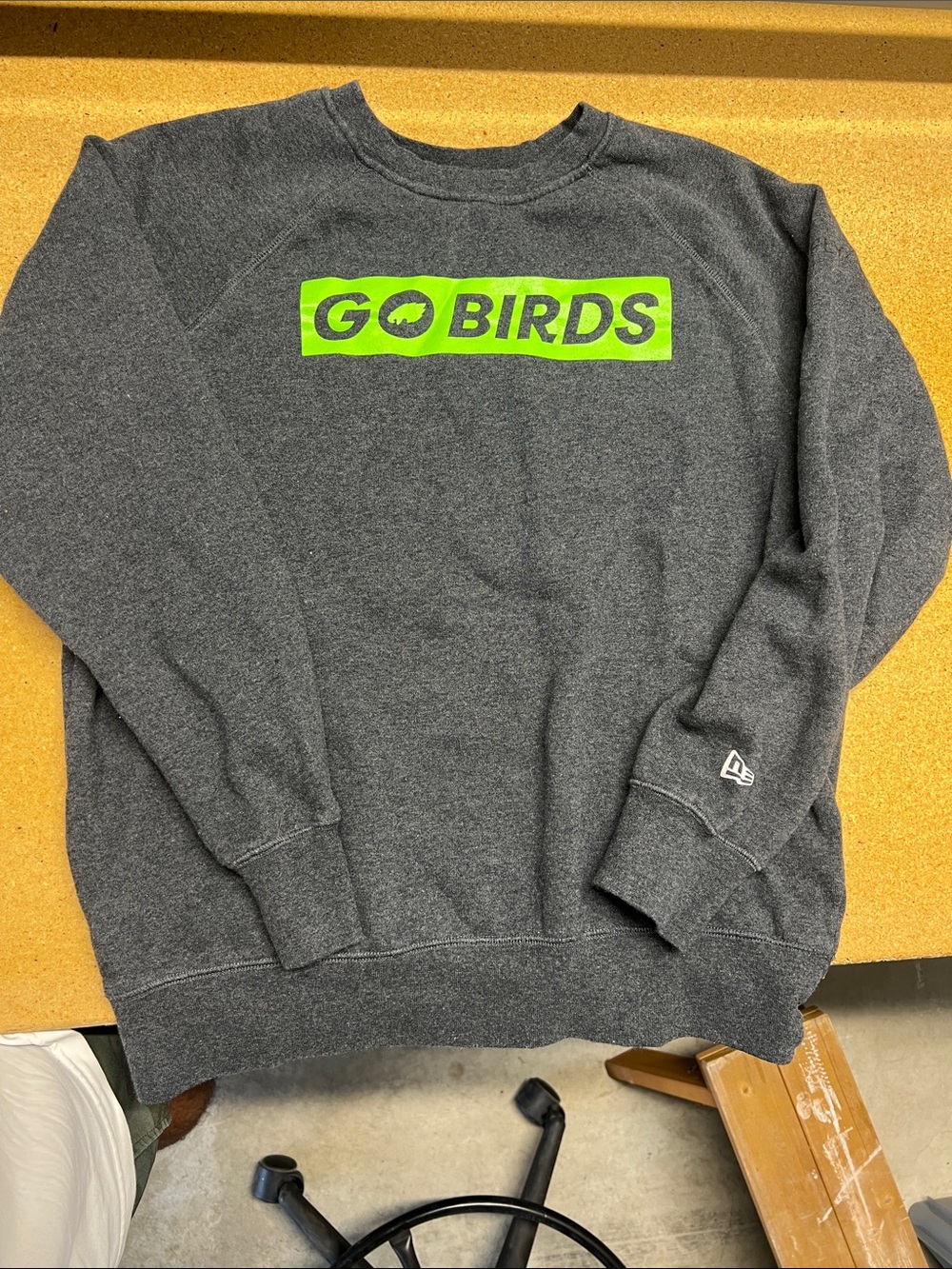New Era Charcoal Gray Sweatshirt with Neon Green "GO BIRDS" Logo